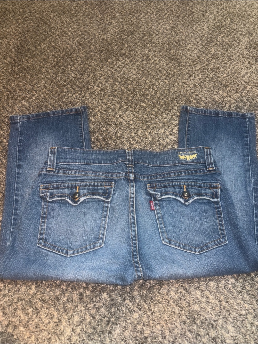 Levi's Medium Blue Mid Rise Denim capris with Flap Back Pockets